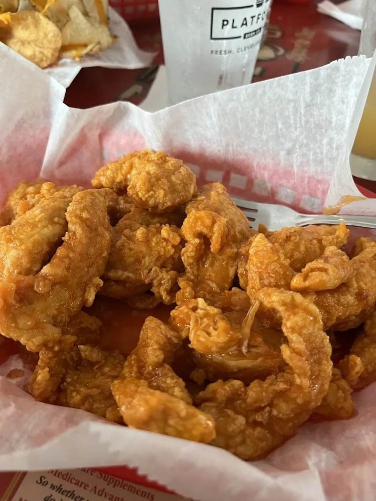 Homemade Chicken Fingers with Hot Wing Sauce